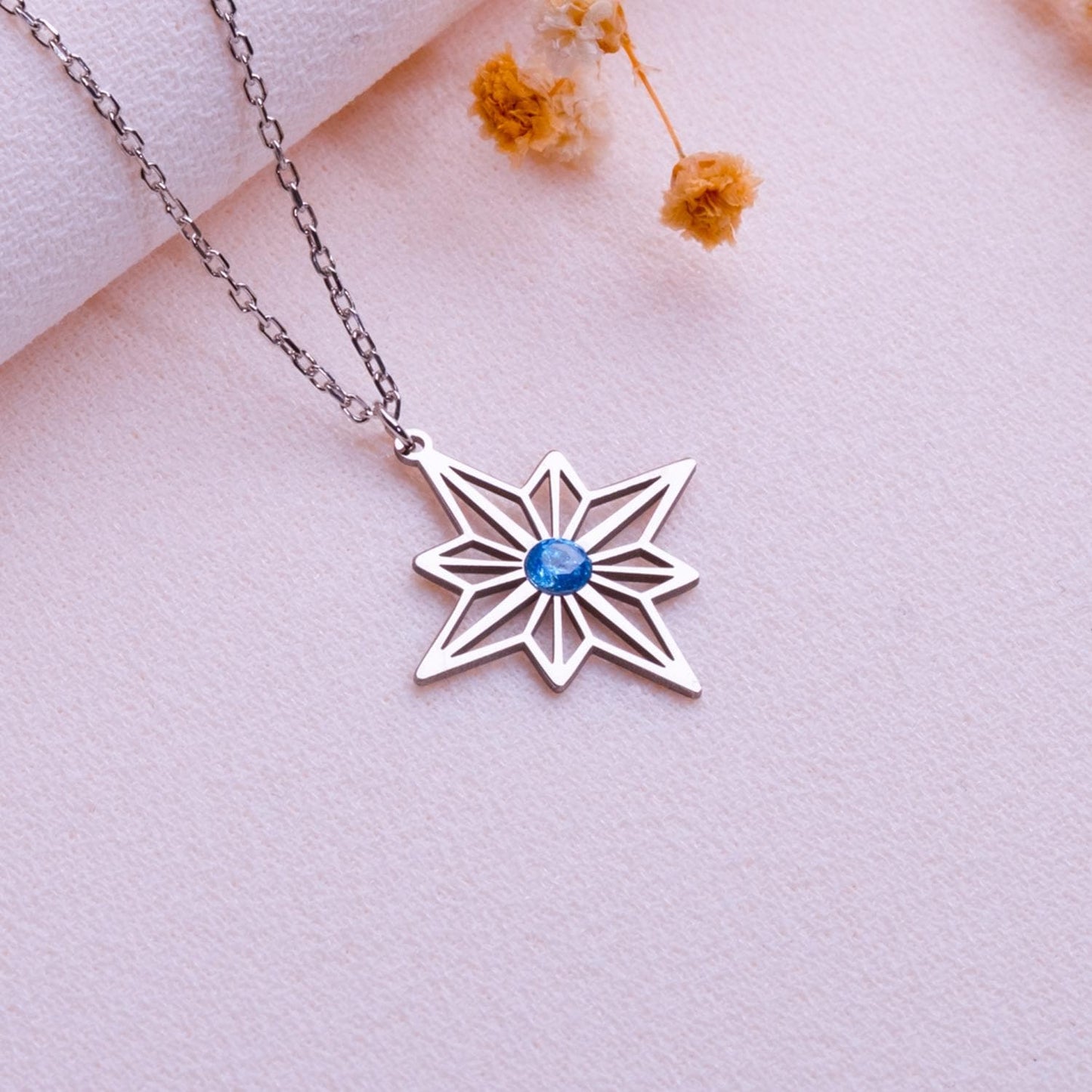 Silver Eight Point Star Necklace with Blue Gemstone Pendant