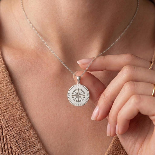 Compass jewelry design featured in the Rimossa meaning guide