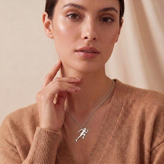 Running Woman: History, Meaning, and Jewelry Symbolism