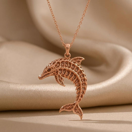 The Dolphin Symbol jewelry design featured in the Rimossa meaning guide