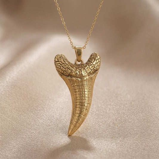 Dakosaurus Tooth jewelry design featured in the Rimossa meaning guide
