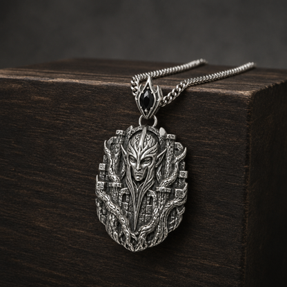 Oxidized 925 sterling silver pendant necklace with curb chain, featuring an elven sentinel face framed by bark-like forest fortress relief and a pointed bail with a dark oval accent.
