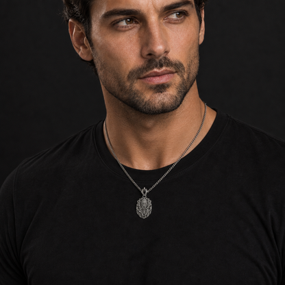 Oxidized 925 sterling silver pendant necklace with curb chain, featuring an elven sentinel face framed by bark-like forest fortress relief and a pointed bail with a dark oval accent.
