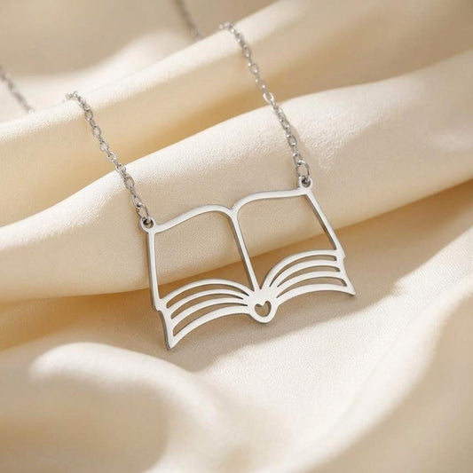 Silver Custom Book Necklace with curved page lines on ivory fabric
