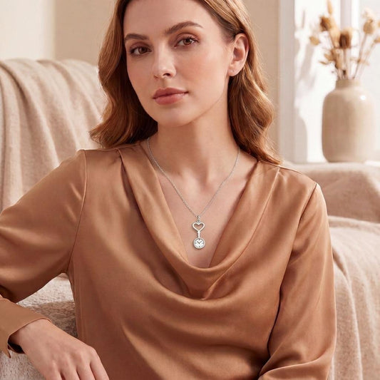 Nurse Watch Necklace with open heart and watch-face pendant worn with a bronze satin blouse