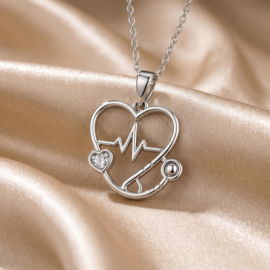 Silver Nurse Stethoscope Heart Necklace with heartbeat line on champagne satin