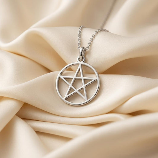 Open five-point pentagram pendant inside a smooth circular frame on ivory satin