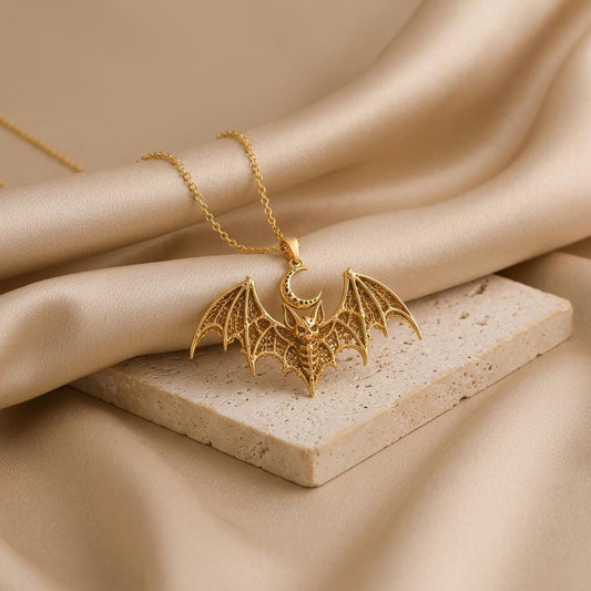 Close-up of handmade Lunar Bat Relic pendant | Gold Plated Sterling Silver | Gothic Celestial Theme | Unique Statement Gift