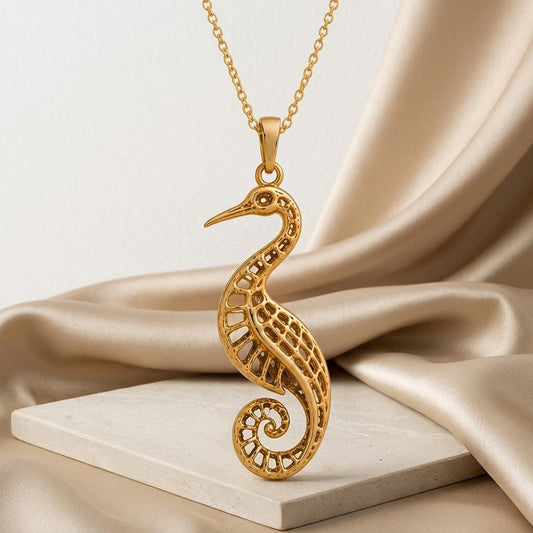 Close-up of handmade Fossil Crane Pendant | Sterling Silver Necklace | Filigree Bird Design | Symbolic Nature Gift
